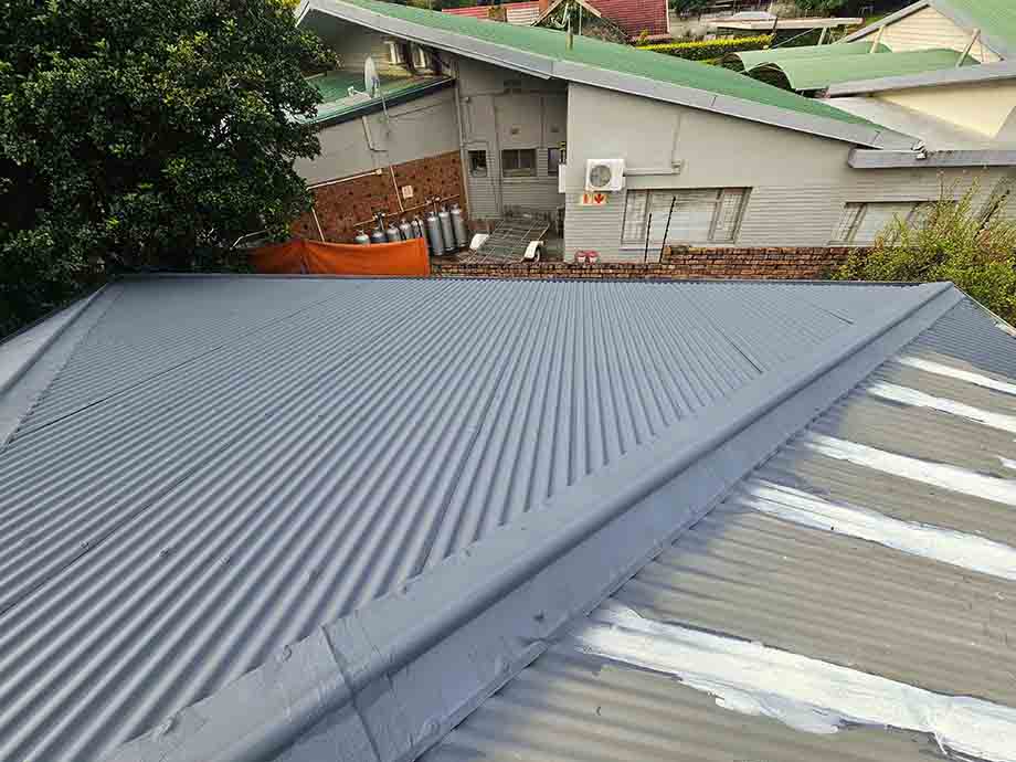 Seamless gutter installation and gutter brackets on home